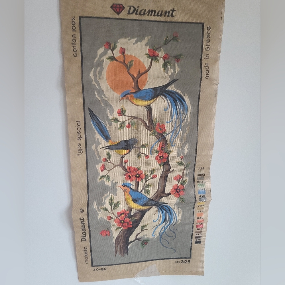 vintage Unfinished needlepoint canvas featuring a bird and floral design